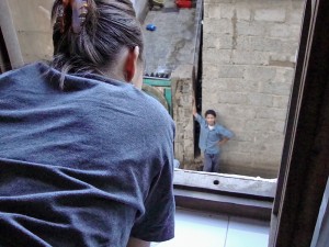 The window of Yemen, Tricia looking out at life outside her room...