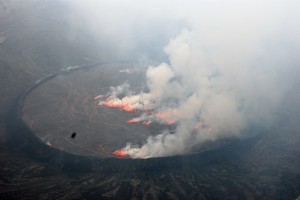 Once we reached the top, clouds moved in after a heavy rain, and we could finally look down into the enormous crater. Suddenly, the clouds dispersed and we could see three gigantic lava pools fuming with orange heat! It is an extra ordinary experience to see this!