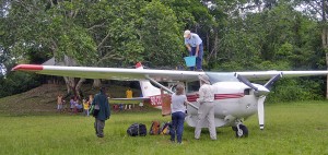 Captain Jon Cadd preparing for another odd flight. This time with a bunch of explorers who feared the long drive from Epulu to Kisangani in a car on the worst road on earth. So, Jeff, always generous, decided 2 hours was better!