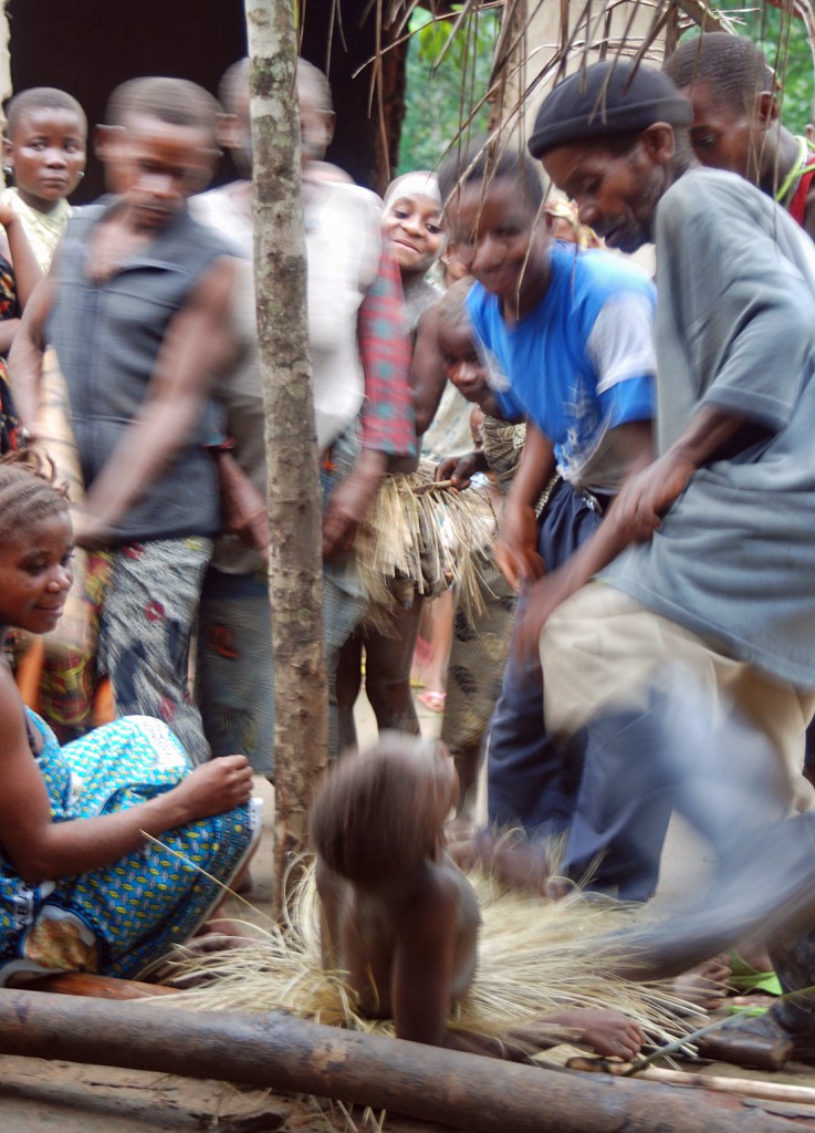 The play they set up, which depicts the rebell leader Bemba attacking the village, drinking the blood of virgins.