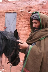 Mullah Khodadad cancelling the spell cast on Louis Meunier's horse by jinns