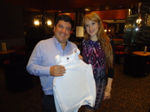 Miguel Caballero and Carolina Ballesteros holding one of their company's bulletproof products.