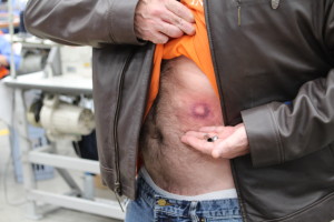 Author Jim Clash had a painful bruise after being shot despite wearing a bulletproof leather jacket.