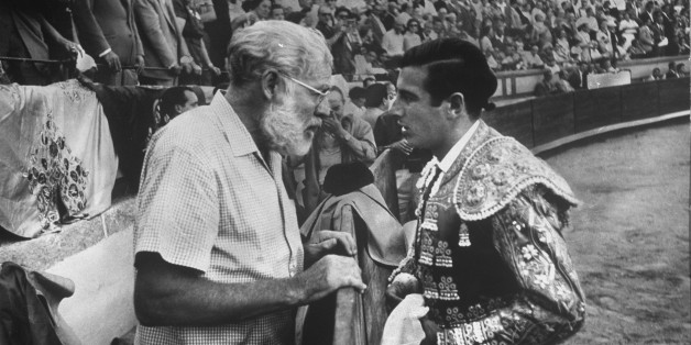 Spanish matador Antonio Ordonez (R) chatting w. his friend, author Ernest Hemingway, in arena before bullfight. (Photo by Loomis Dean//Time Life Pictures/Getty Images)